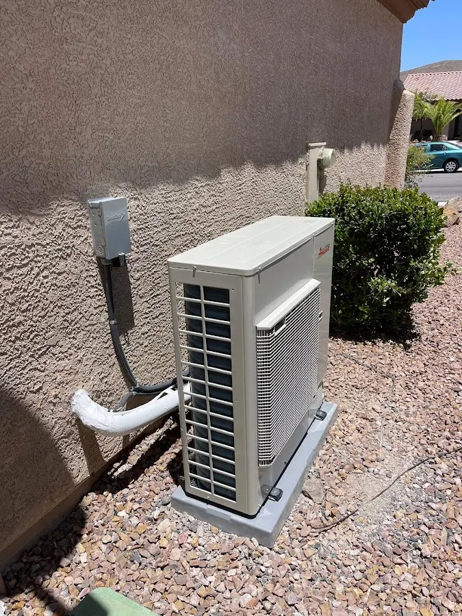 Residential air conditioning condenser unit in Cascade